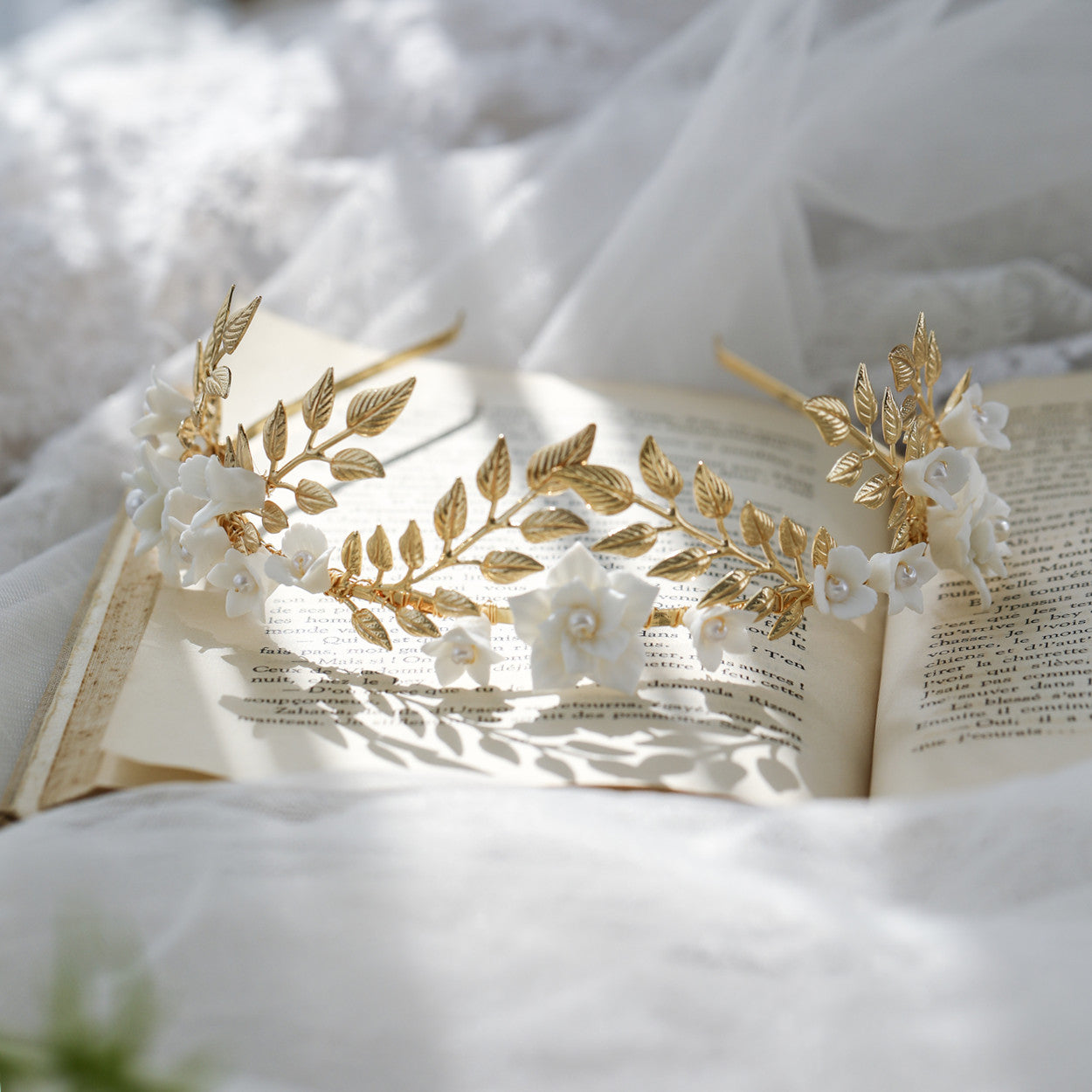 Hair band with gold leaf and silver leaf branches and white ceramic flowers