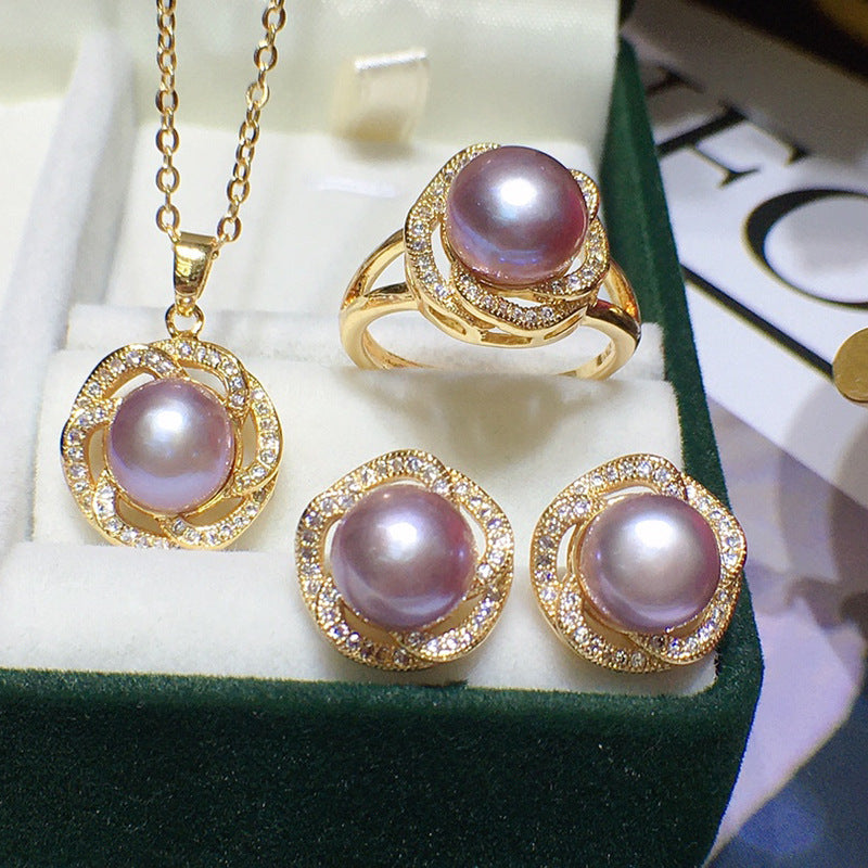 Freshwater pearl jewelry set, four-piece lavender pearls on gold-tone pavé rings, includes necklace, ring, and two earrings.