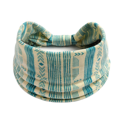 Bohemian Cashew Yoga Sports headband with turquoise geometric pattern on beige fabric