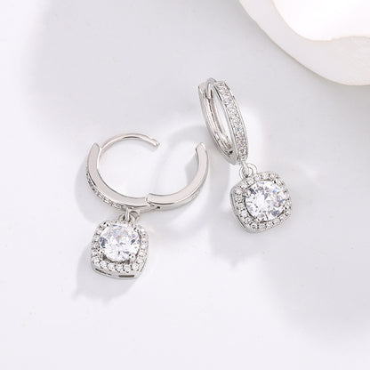 Earrings, silver-tone hoops with square princess-cut moissanite halos and dangling pendants