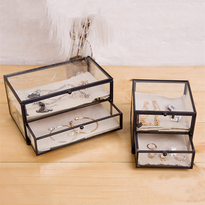 edenista jewelry storage boxes with two glass display boxes and black metal frames, showcasing rings and bracelets