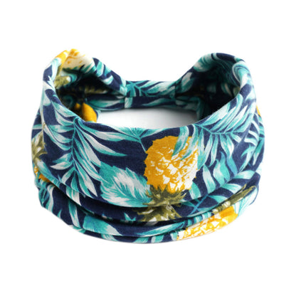 Bohemian Cashew Yoga headband Elastigirl; absorbent tropical floral print in teal, navy, and yellow