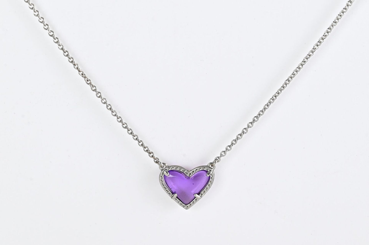 Cubic Zirconia Heart Pendant Necklace with purple heart centerpiece on silver-tone chain