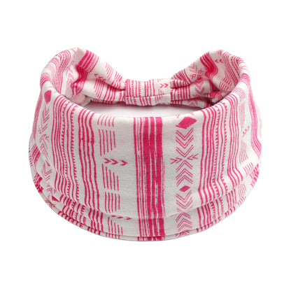 Bohemian Cashew Yoga sports headband in pink and white geometric pattern