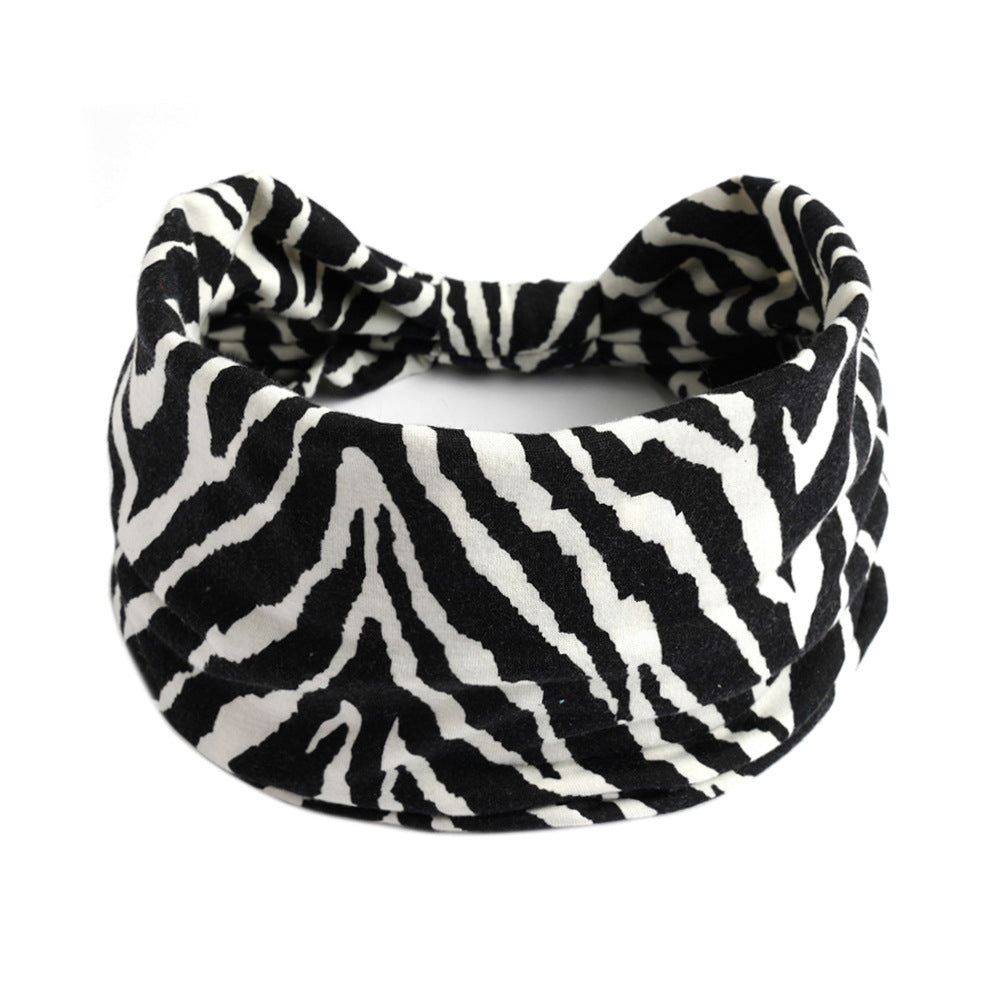 Yoga headband with black and white zebra print fabric