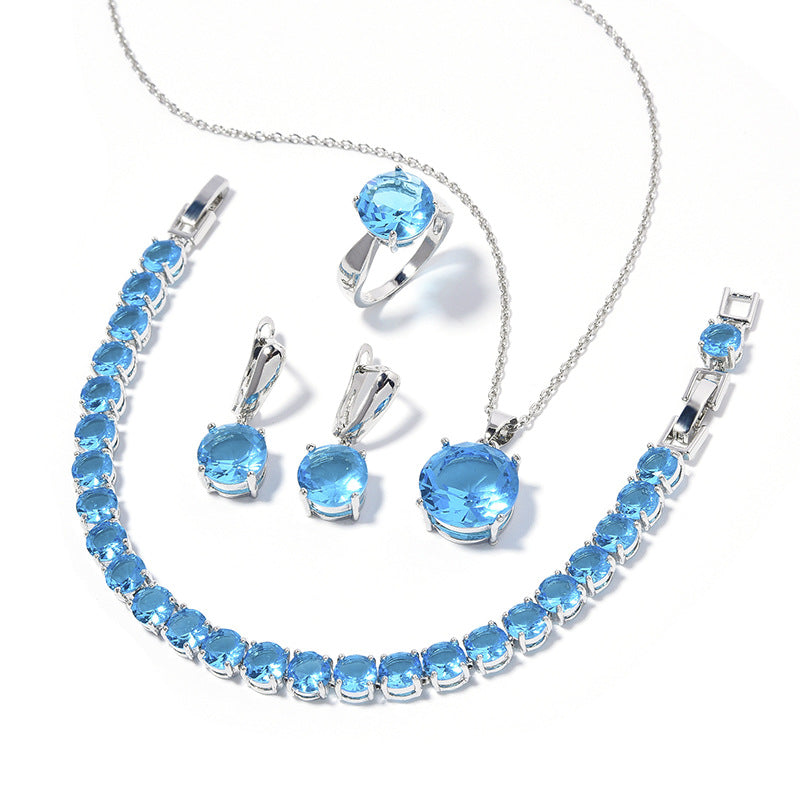 Geometric blue gemstone jewelry set, 4-piece by CJ: necklace, bracelet, ring, earrings