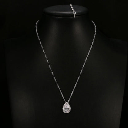 Water Drop Gemstone Necklace with silver chain and teardrop pendant on black display