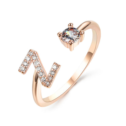 Rose gold adjustable initial N ring with pave crystals
