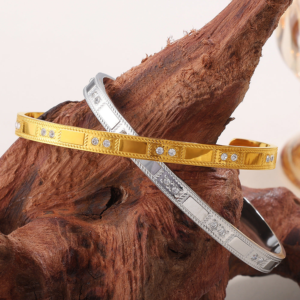 Bracelet pair: buckle alloy open-end, gold and silver with crystal accents, CJ brand
