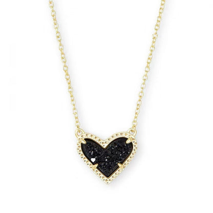 Cubic Zirconia Heart Pendant Necklace in gold-tone with a black heart centerpiece and beaded bezel