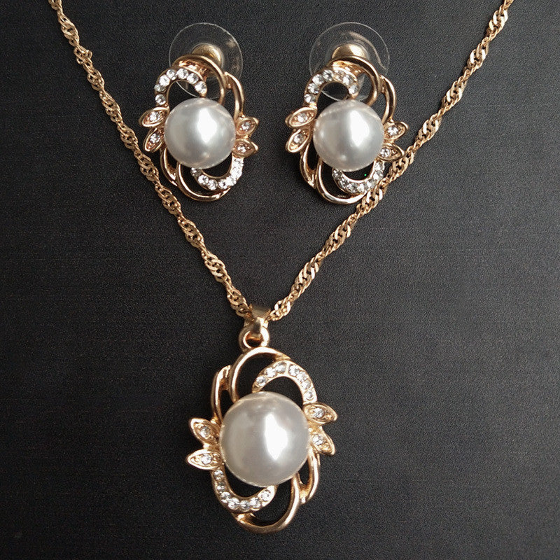 Bridal pearl jewelry set; 3-piece gold-tone necklace with crystal-accent pendant and matching pearl earrings