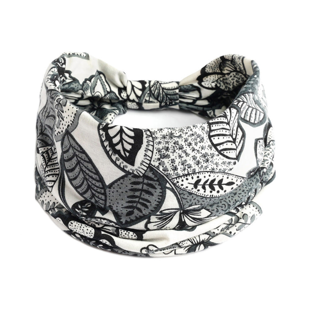 Bohemian Cashew yoga headband, black-and-white leafy pattern fabric