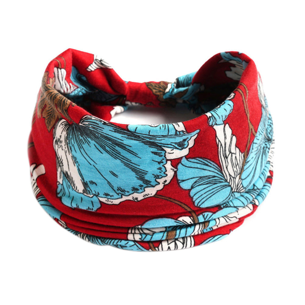 Headband by CJ; red bohemian yoga headband with blue floral print.