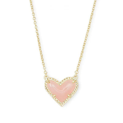 Cubic Zirconia Heart Pendant Necklace with pink heart centerpiece on gold-tone chain