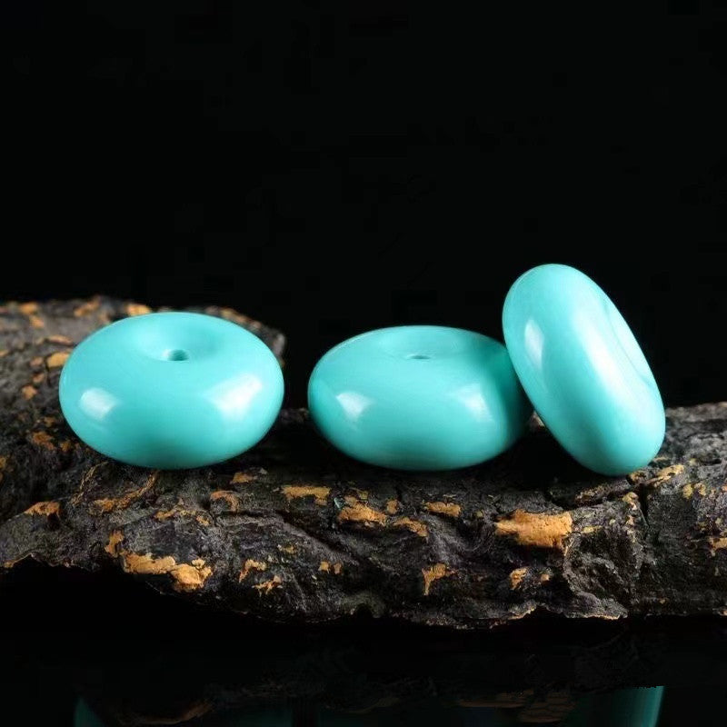 Set of 3 turquoise porcelain bread ring beads by cj, donut-shaped and glossy