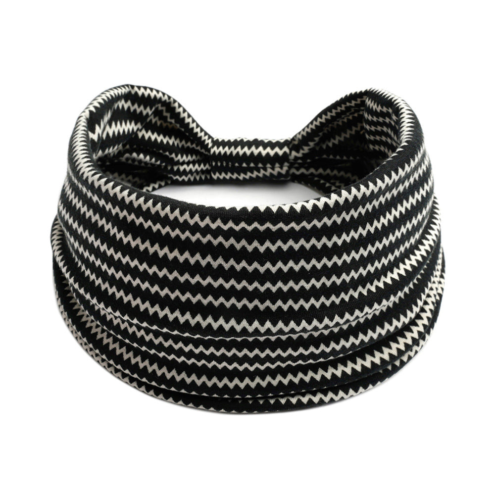 Bohemian Cashew Yoga Sports Headband in black and white chevron pattern with knot by cj