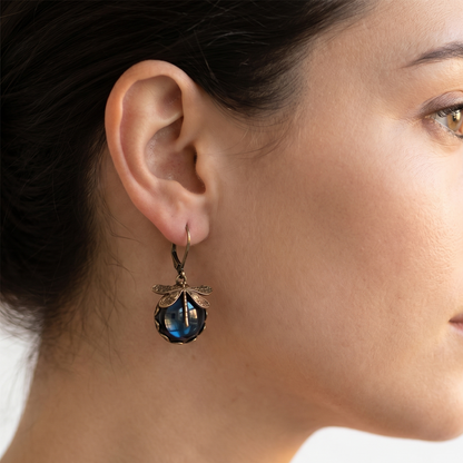 Earrings: gold dragonfly pendant with blue bead, vintage boho Chakra style