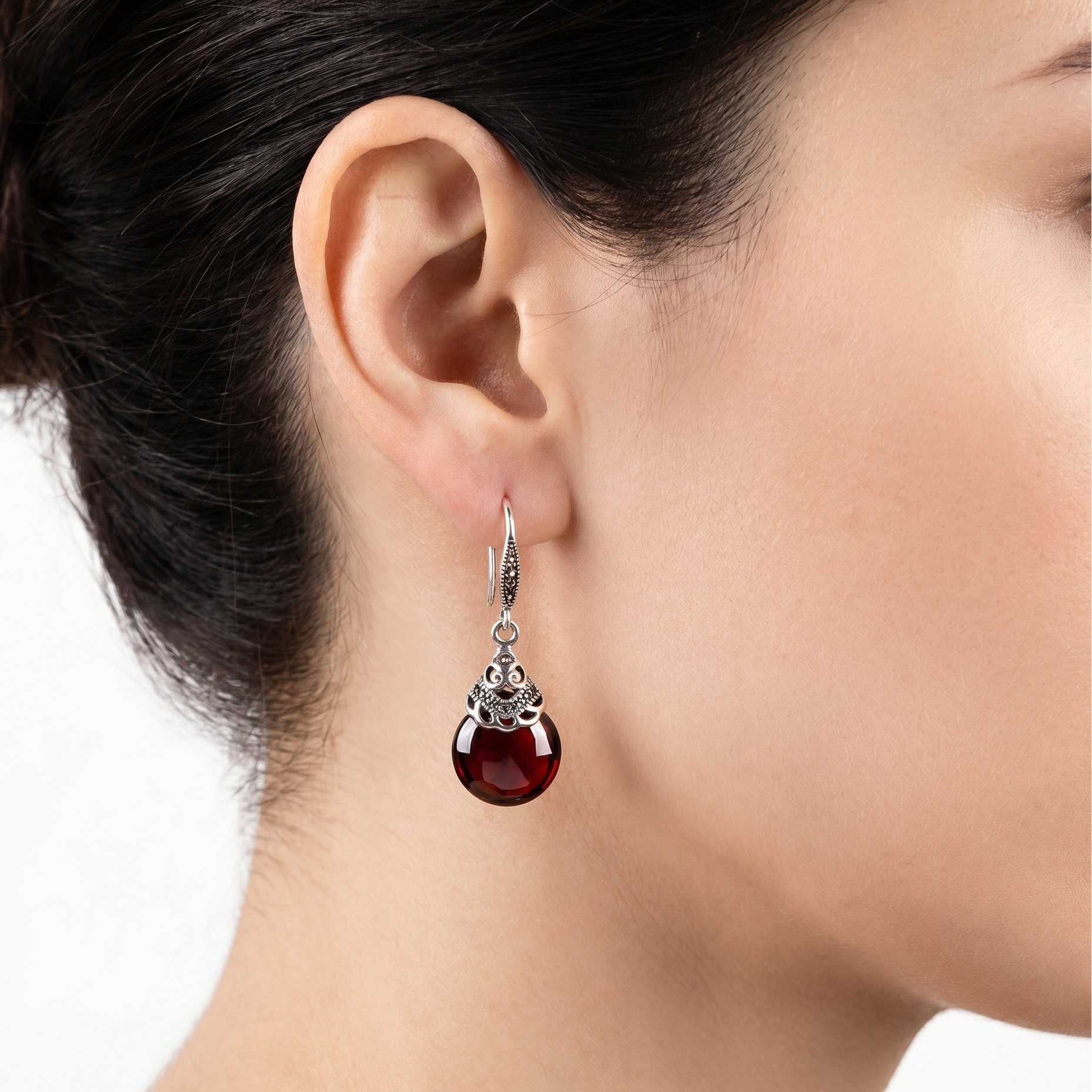 Vintage round garnet earrings; silver-tone filigree drop with a deep red garnet gemstone