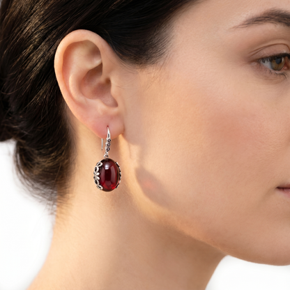 Garnet drop earring by Edenista, silver with ornate filigree setting